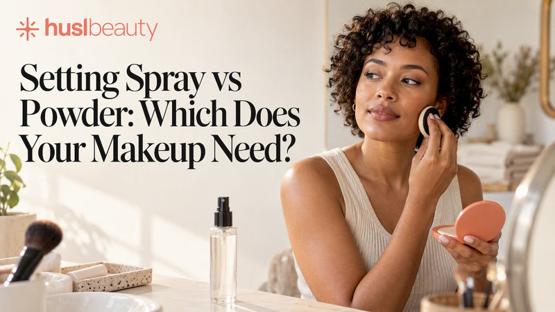 Woman finishing makeup beside powder and spray