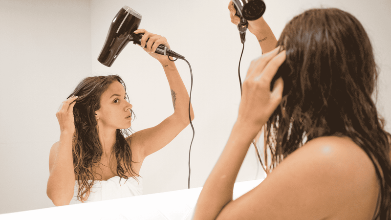 How to Dry Your Hair Faster Without Using More Heat